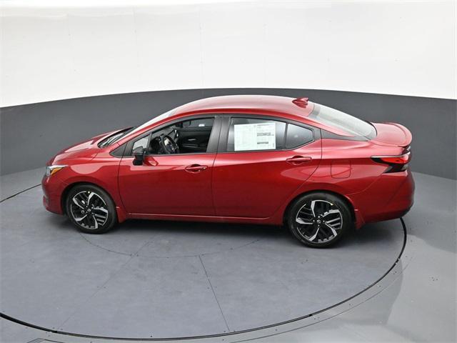 Photo of 2025 Scarlet Ember Tintcoat Nissan Versa