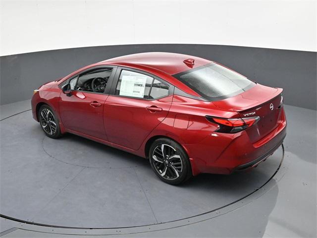 Photo of 2025 Scarlet Ember Tintcoat Nissan Versa