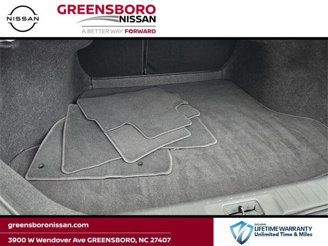 Photo of 2024 Aspen White Tricoat Nissan Sentra