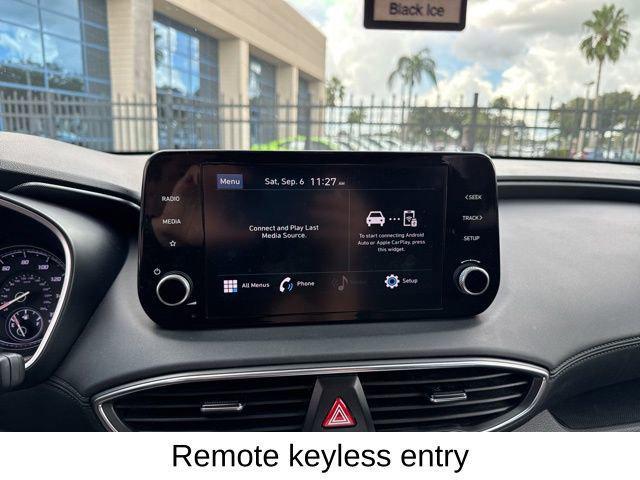 Photo of 2023 Calypso Red Hyundai SANTA FE