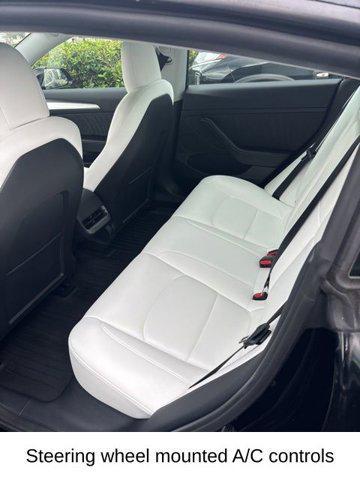 Photo of 2022 Solid Black Tesla Model 3