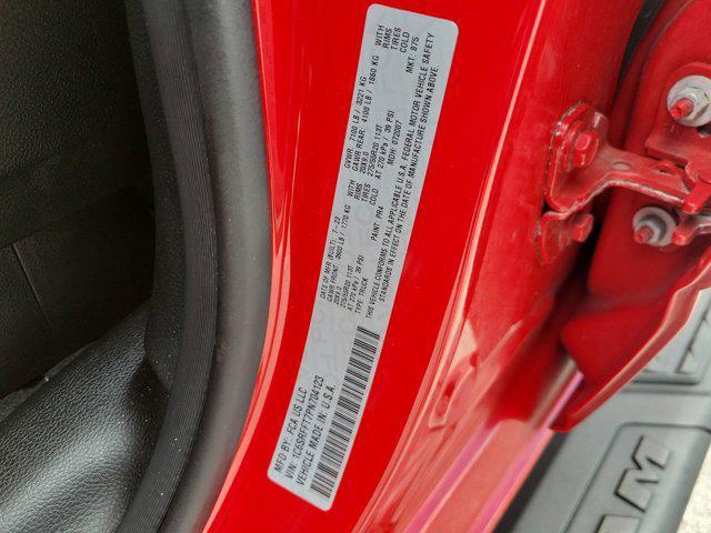Photo of 2023 Flame Red Clearcoat RAM 1500