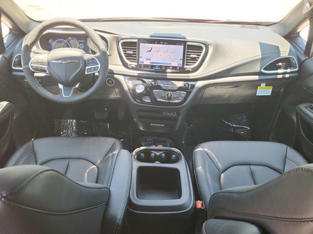 Photo of 2025 Red Hot Pearlcoat Chrysler Pacifica