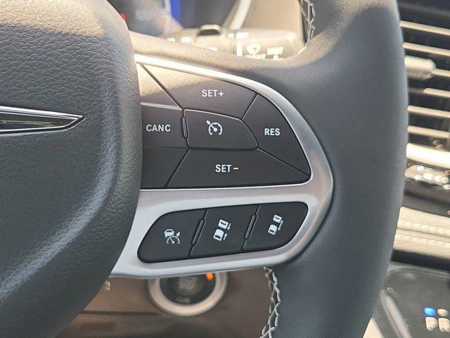 Photo of 2025 Red Hot Pearlcoat Chrysler Pacifica