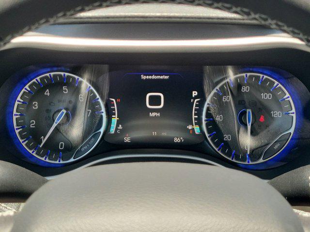 Photo of 2025 Red Hot Pearlcoat Chrysler Pacifica