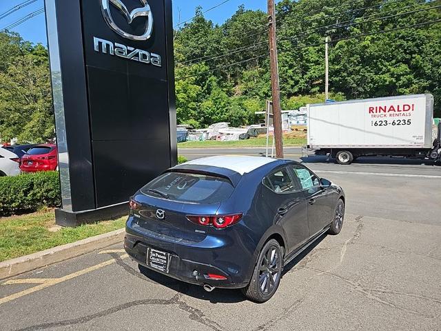 Photo of 2025 Deep Crystal Blue Mica Mazda Mazda3