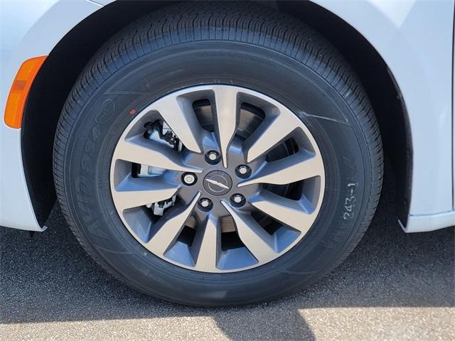 Photo of 2025 Bright White Clearcoat Chrysler Pacifica Hybrid