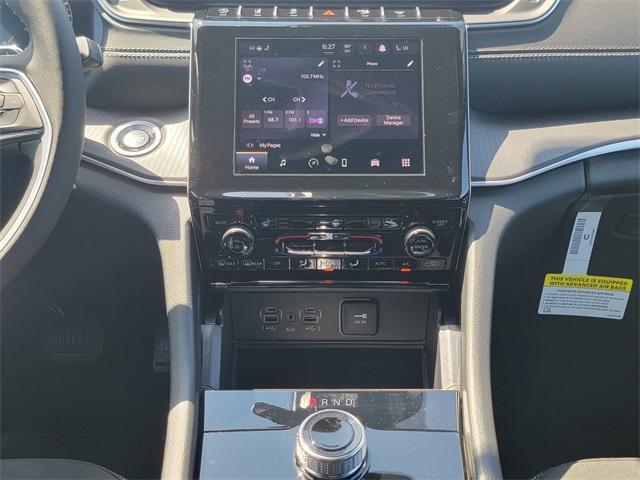 Photo of 2025 Bright White Clearcoat Jeep Grand Cherokee
