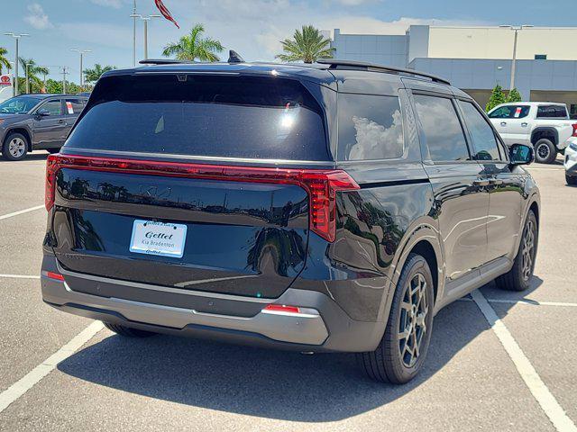 Photo of 2026 Aurora Blue Kia Carnival
