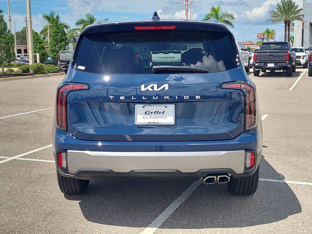 Photo of 2025 Midnight Lake Blue Kia Telluride