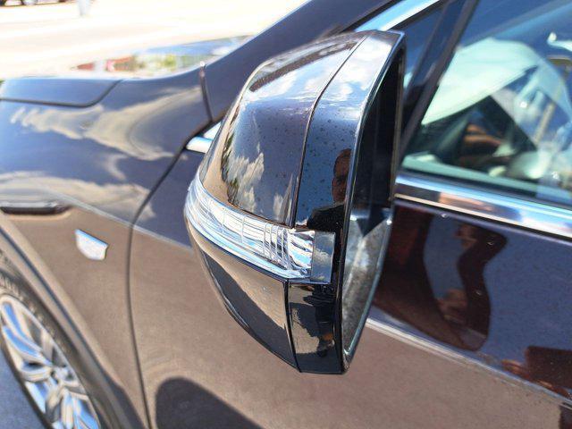 Photo of 2021 Garnet Metallic Cadillac XT4