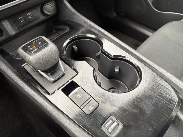 Photo of 2024 Glacier White Nissan Rogue