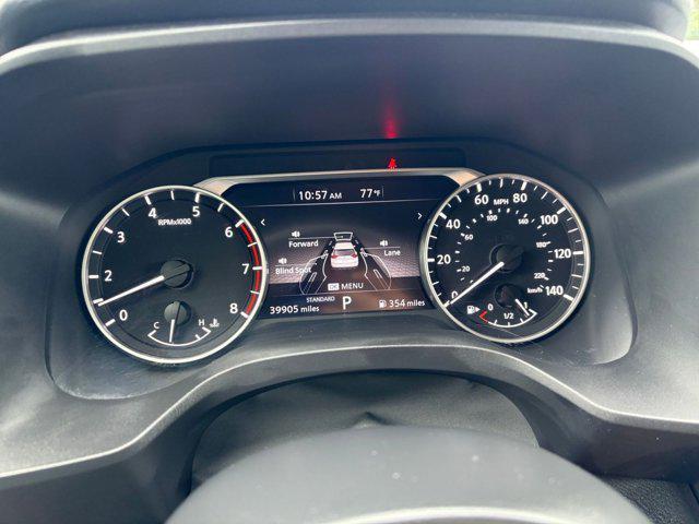 Photo of 2024 Glacier White Nissan Rogue
