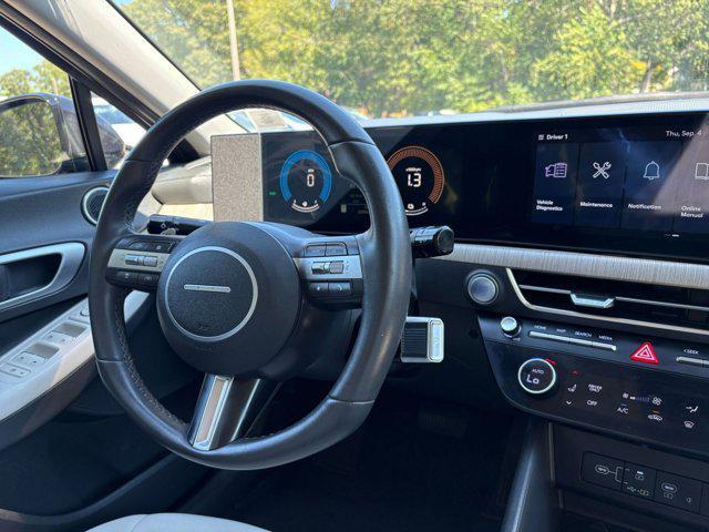 Photo of 2024 Carbon Blue Hyundai SONATA Hybrid