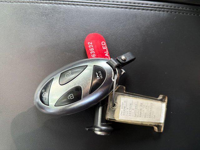 Photo of 2024 Serenity White Hyundai SANTA FE
