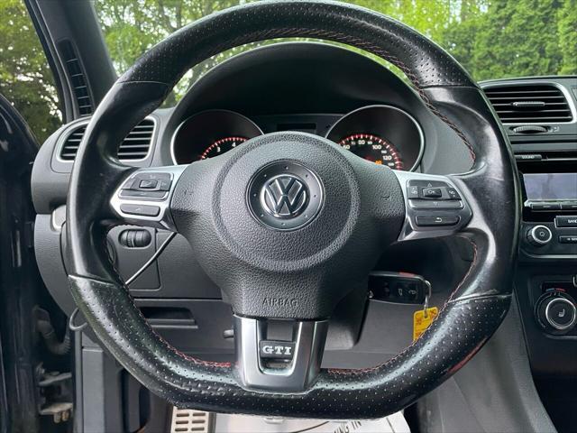 Photo of 2013 Deep Black Pearl Metallic Volkswagen GTI