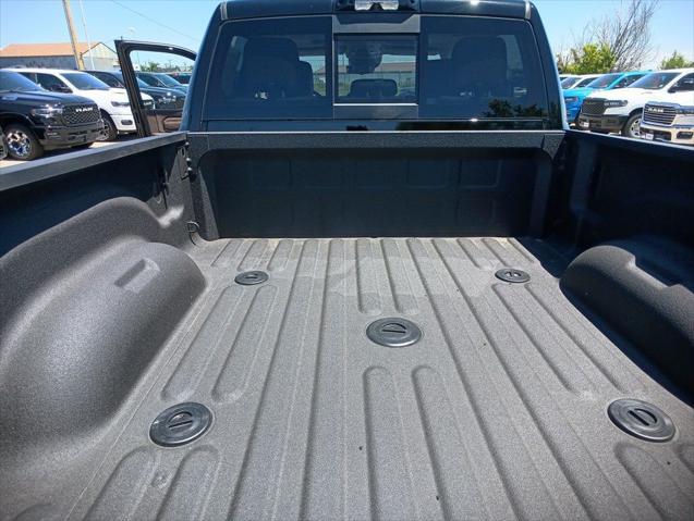 Photo of 2025 Diamond Black Crystal Pearlcoat RAM 2500