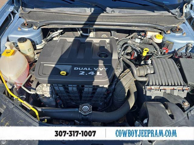 Photo of 2013 Crystal Blue Pearlcoat Dodge Avenger