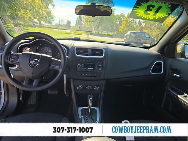 Photo of 2013 Crystal Blue Pearlcoat Dodge Avenger