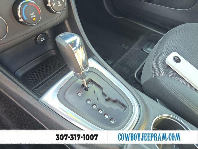 Photo of 2013 Crystal Blue Pearlcoat Dodge Avenger