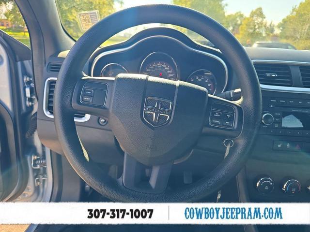 Photo of 2013 Crystal Blue Pearlcoat Dodge Avenger