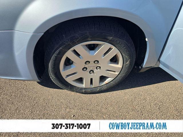 Photo of 2013 Crystal Blue Pearlcoat Dodge Avenger
