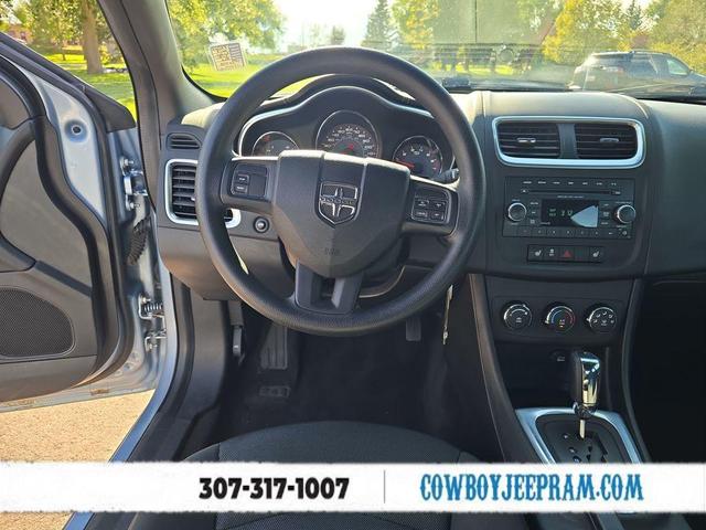 Photo of 2013 Crystal Blue Pearlcoat Dodge Avenger