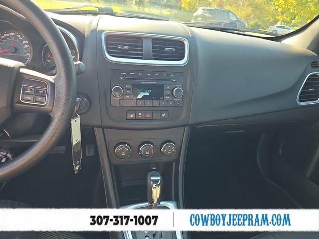 Photo of 2013 Crystal Blue Pearlcoat Dodge Avenger