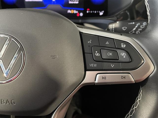 Photo of 2022 Dusk Blue Metallic Volkswagen Taos