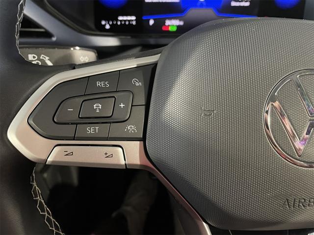 Photo of 2022 Dusk Blue Metallic Volkswagen Taos