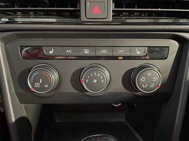 Photo of 2022 Dusk Blue Metallic Volkswagen Taos