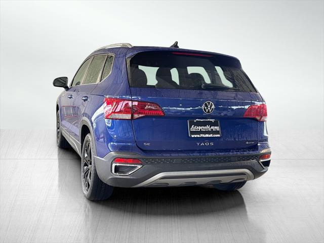 Photo of 2022 Dusk Blue Metallic Volkswagen Taos