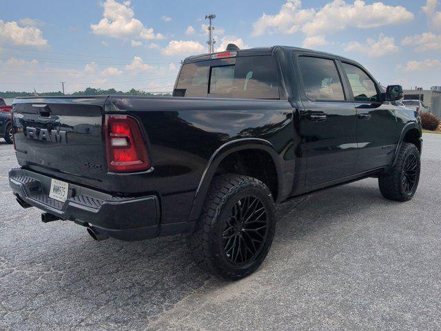 Photo of 2025 Diamond Black Crystal Pearlcoat RAM 1500