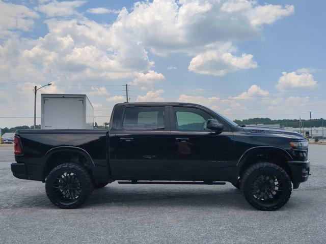 Photo of 2025 Diamond Black Crystal Pearlcoat RAM 1500