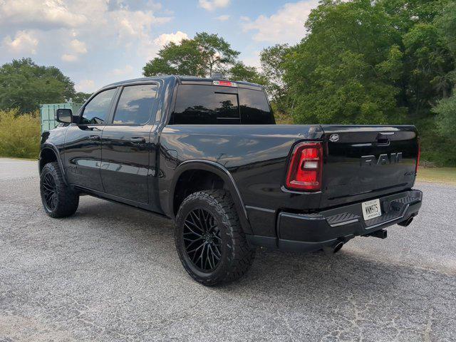Photo of 2025 Diamond Black Crystal Pearlcoat RAM 1500