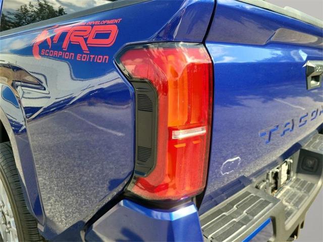 Photo of 2024 Blue Crush Metallic Toyota Tacoma