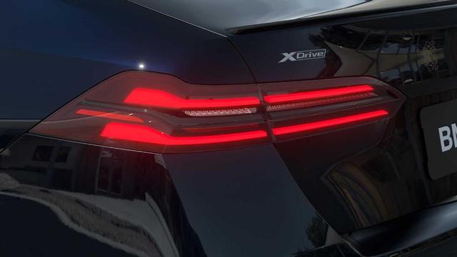 Photo of 2026 Carbon Black Metallic BMW 540
