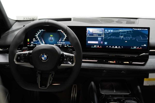 Photo of 2026 Black Sapphire Metallic BMW 530
