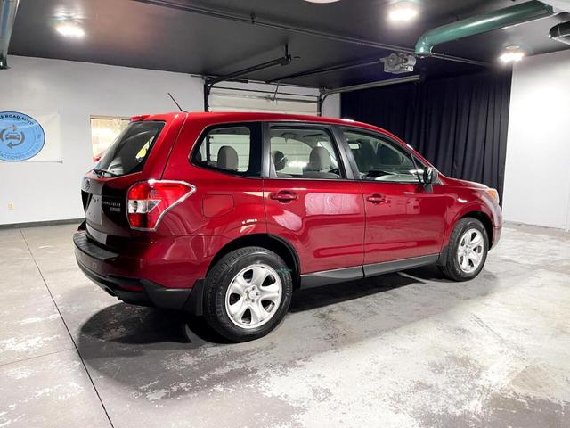 Photo of 2014 Venetian Red Pearl Subaru Forester
