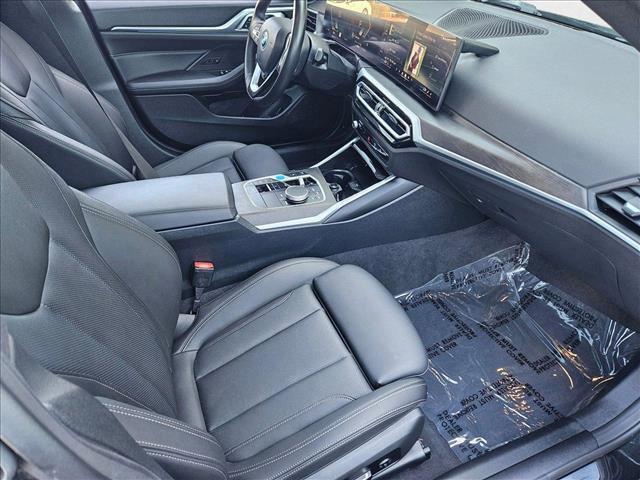 Photo of 2024 Black Sapphire Metallic BMW i4 Gran Coupe