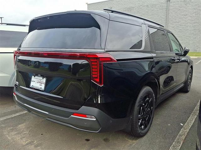 Photo of 2026 Aurora Black Pearl Kia Carnival