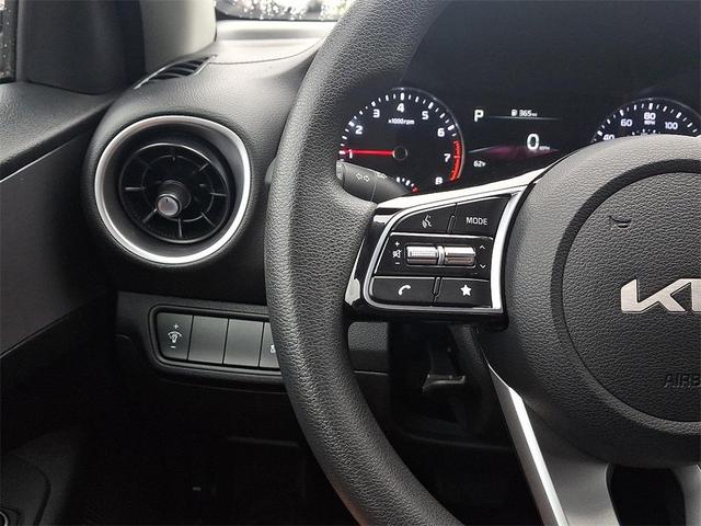 Photo of 2023 Currant Red Kia Forte