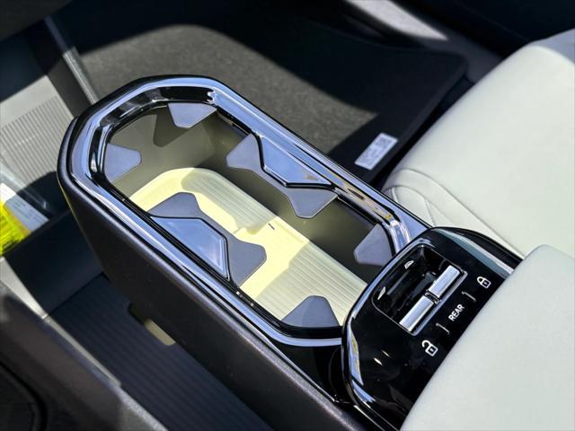 Photo of 2025 Moss Yellow Volvo EX30