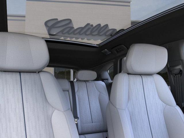 Photo of 2025 Monarch Orange Cadillac OPTIQ