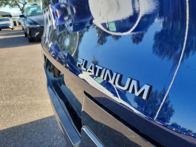 Photo of 2025 Deep Ocean Blue Pearl/Super Black Nissan Murano
