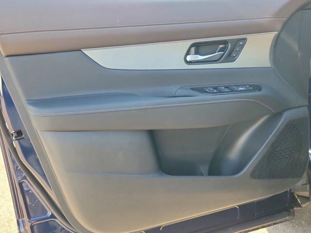 Photo of 2025 Deep Ocean Blue Pearl/Super Black Nissan Murano