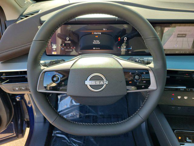 Photo of 2025 Deep Ocean Blue Pearl/Super Black Nissan Murano