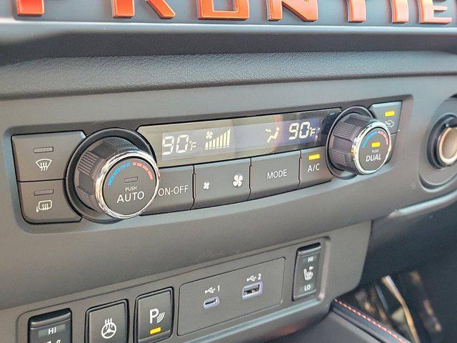 Photo of 2025 Afterburn Orange Nissan Frontier
