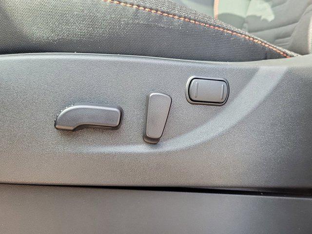 Photo of 2025 Afterburn Orange Nissan Frontier