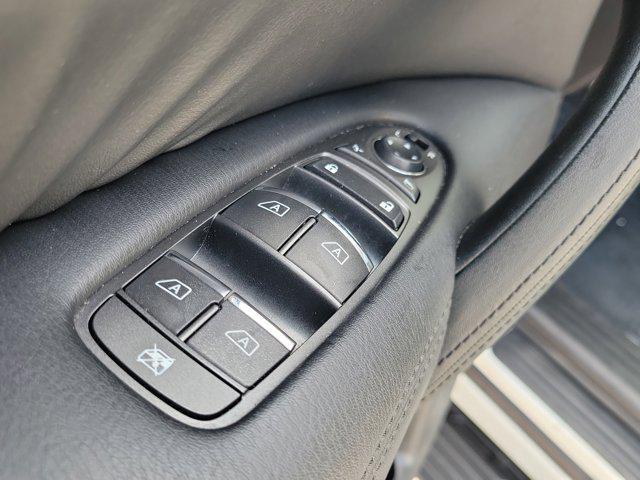 Photo of 2023 Aspen White Tricoat Nissan Armada